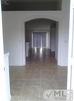 Formal Dining and Living on each side of main entrance.