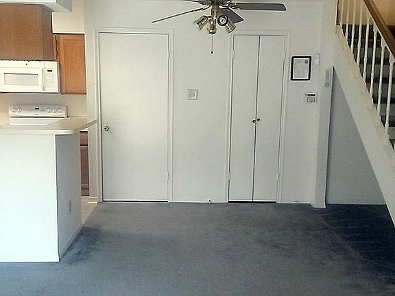 Dining areas with doors to laundry closet and 1/2 bath