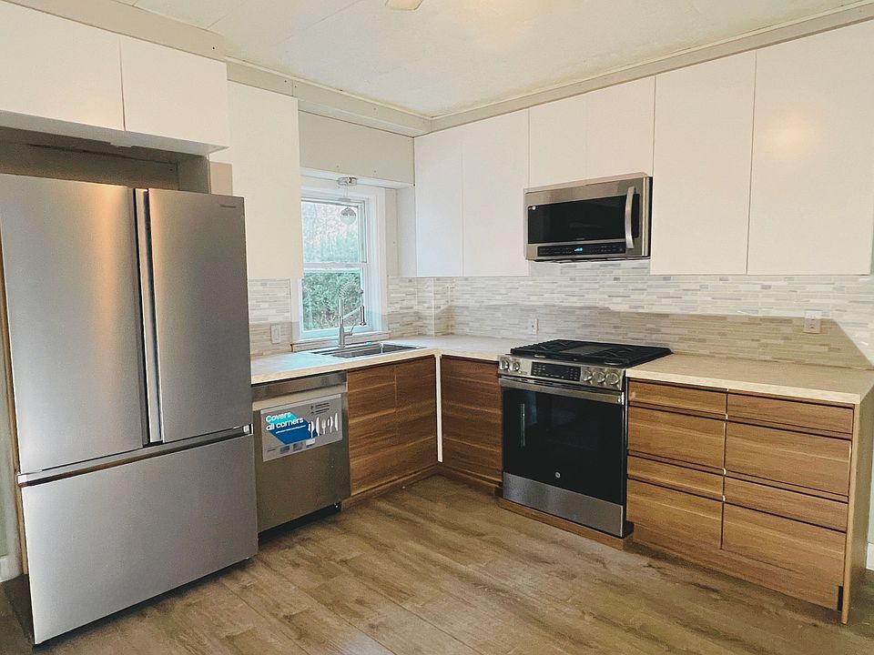 Brand new kitchen cabinets, countertop, and appliances