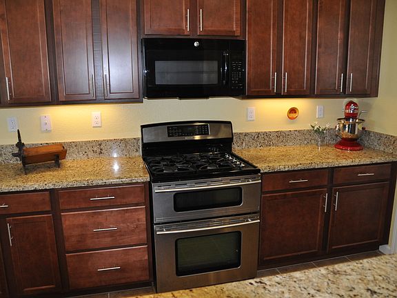 Granite, Cherry Cabinets!