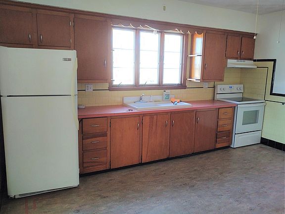 Kitchen, dining, food preparation and cooking area.