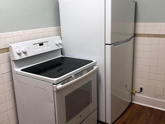 Refrigerator and Smooth Glasstop Stove included.