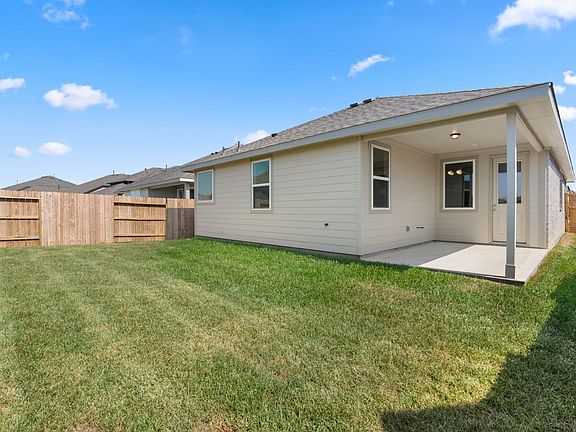 Come and see the spacious backyard with plenty of room for the kids to play and adults to relax