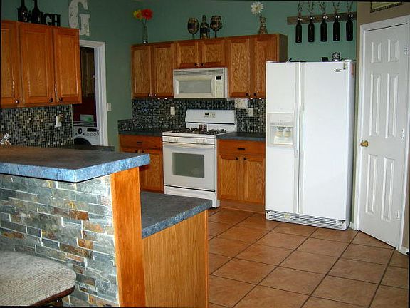 3rd image of 8208 Wolverine Dr NW