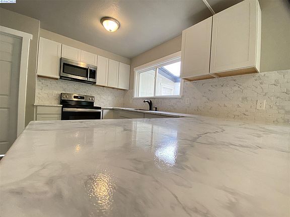 3rd image of 1614 W 10th Ave