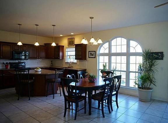 Beehive window in the Breakfast Room brings in lots of light.