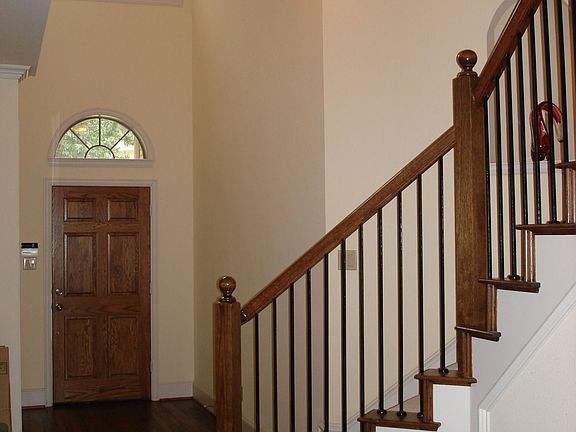 Hand-scraped hardwood floors cover most of the downstairs