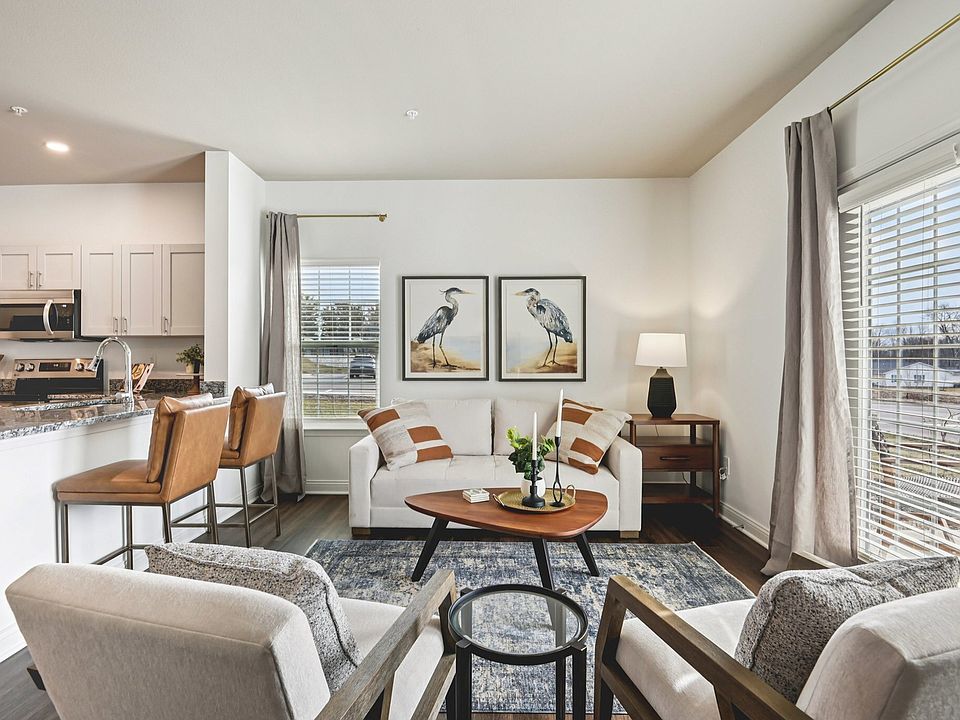 Wrap yourself in the comfort of a bright, inviting living room designed for a cozy home.