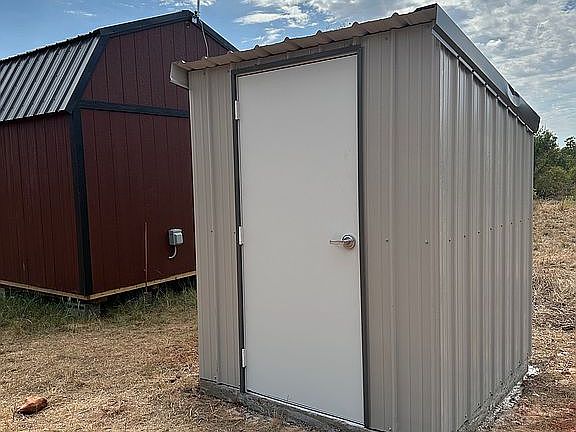 6 X 6 Metal generator shed.