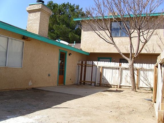 Fenced front and back yards