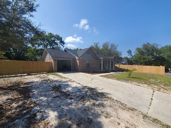 large gate that opens to backyard