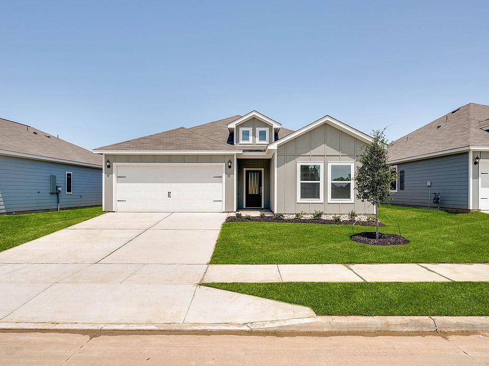 The Sabine is a beautiful one-story, siding home.