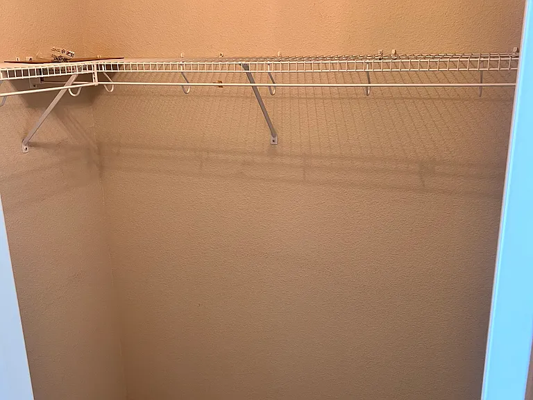 Master Bedroom Walk in Closet #2 - not as big as the other but still huge!