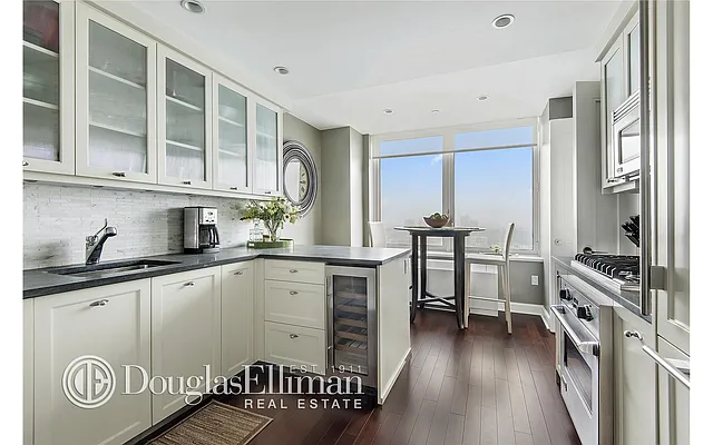 Sold by Douglas Elliman | media 12