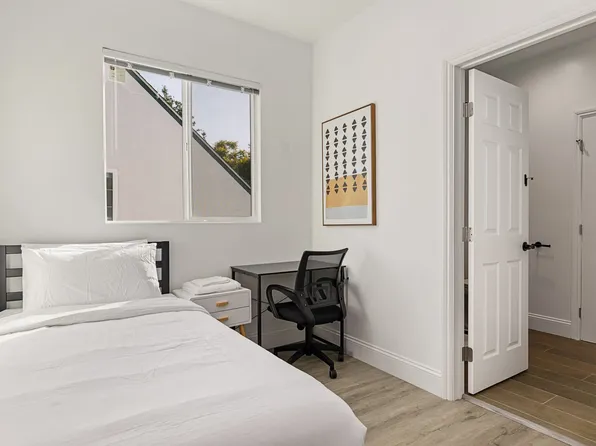 A 5 bedroom, 3 bathroom apartment with common areas and a fully functional kitchen at 1740 Kelton...