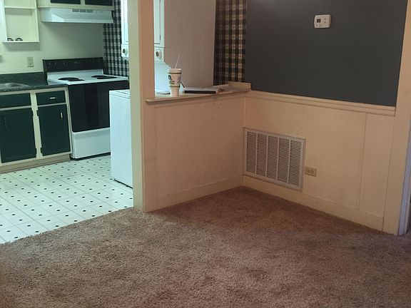 Living room looking into kitchen