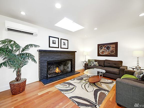 The living featuring the large wood burning fireplace.