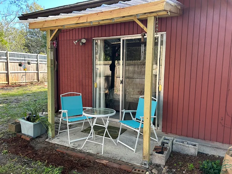 Side patio off of bed 2