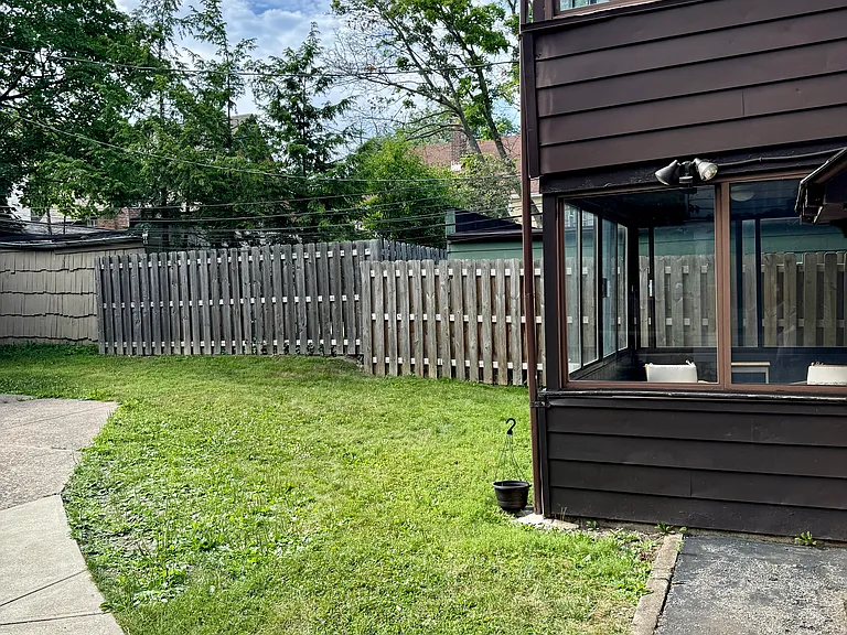 Shared backyard space with room to enjoy the outdoors.