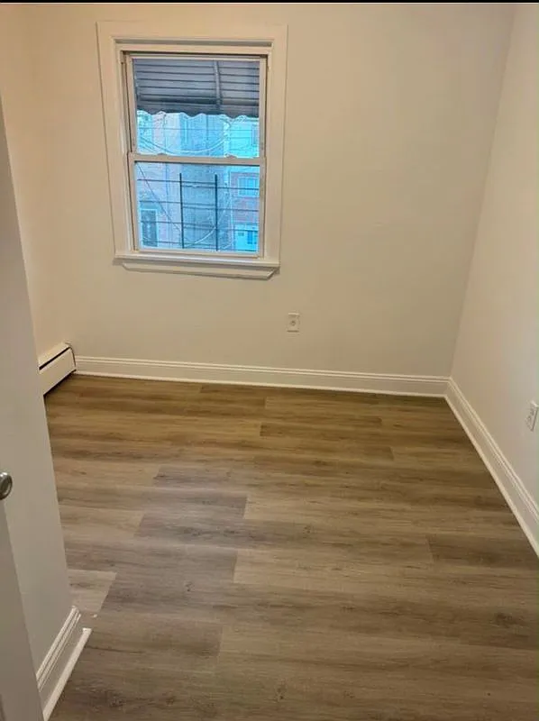 3 bed, 1.0 bath, 1279 sqft, $3,811 — Photo 2
