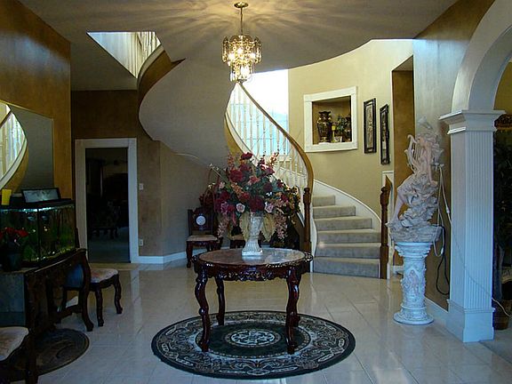 Elegant Two Story Entry with impressive winding stairway