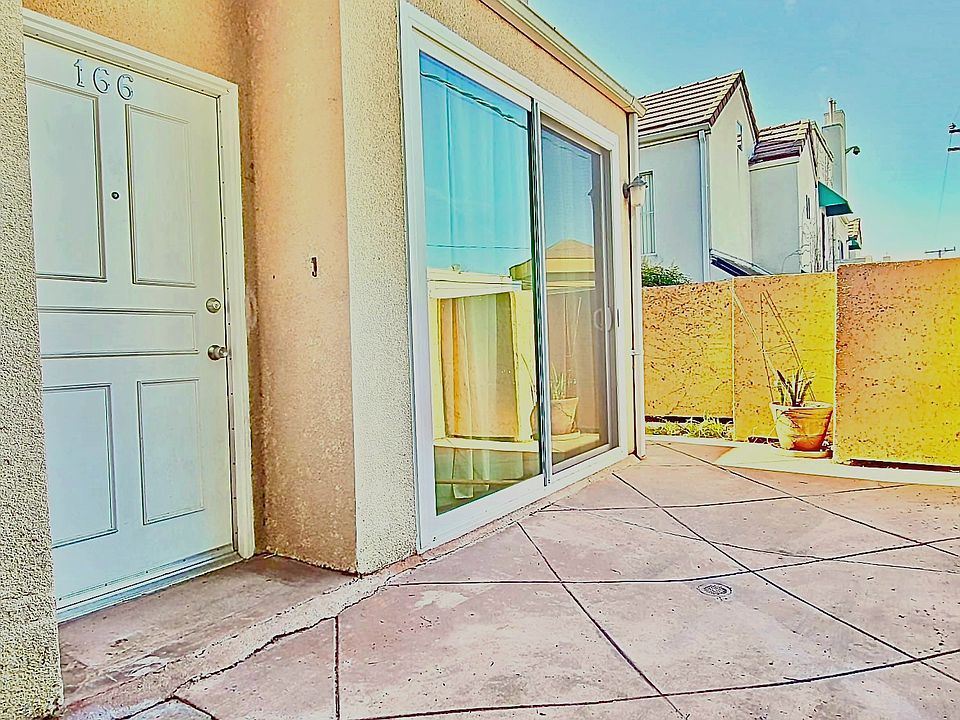 Huge wrap around enclosed front patio.