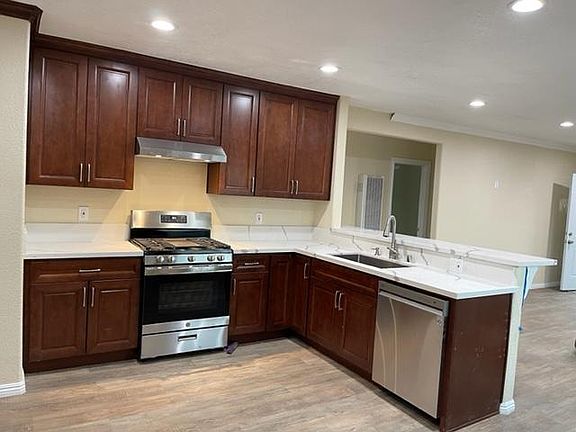 Five burner gas range, dish washer