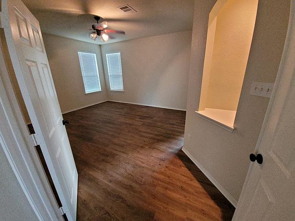 Main floor master suite with 5-piece bath (double sinks) and huge walk-in closet