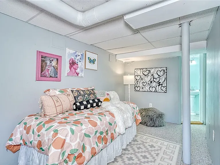 Partially finished basement with full bathroom.