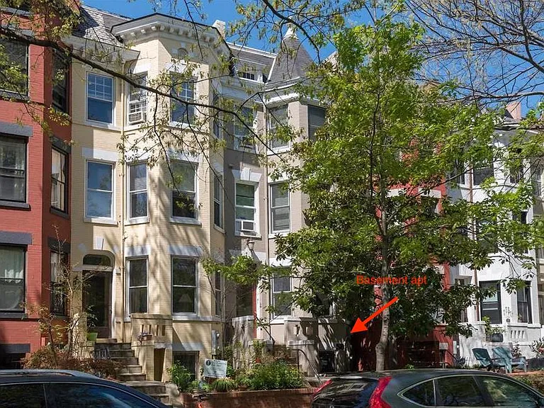 Building exterior. Quiet, treed street.