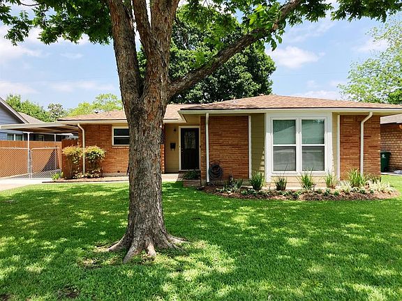 The roof on both the house and garage were recently replaced. Also notice the replaced hi-efficiency replaced windows. See that big oak tree behind the house? It's yours.