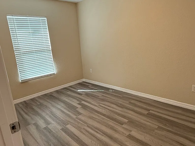 3rd room has vinyl flooring as well.