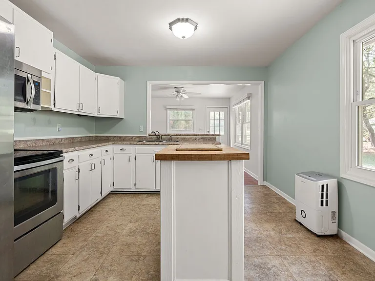 8907 Rollingwood Rd — Photo 2