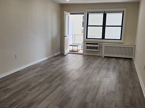 Living room. Photo does not show the width. It is wide.