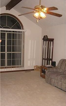 Spacious living room with vaulted ceiling