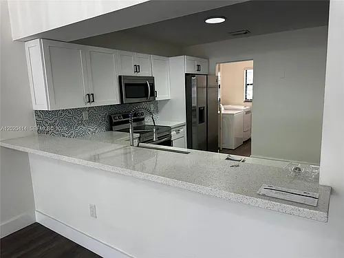 13350 SW 88th Ter #F Photo 1