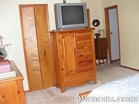 master bed with walk-in closet