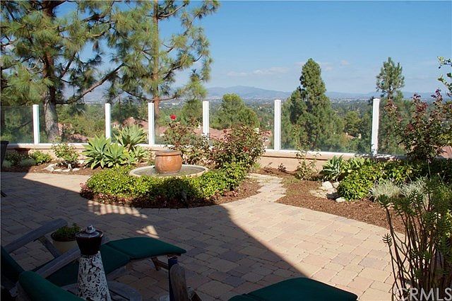 ONE OF A KIND VIEW! Mountains, valleys, city lights...and a gorgeous panorama from this fabulous bac