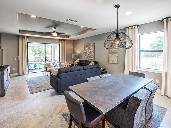 Model Representation Bright and open cafe area, flowing from the kitchen and into the gathering roo