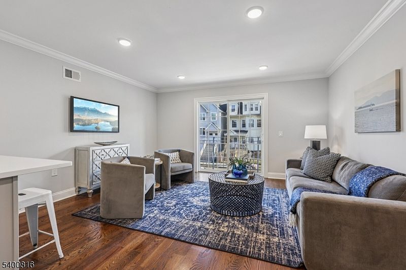 Please note: The apartment is currently not staged. Photos shown are from the first-floor unit and are provided to demonstrate layout, finishes, and design, which are comparable throughout the property.