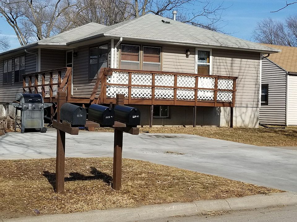 Outside front view/parking. Off street parking. View of two entrances.