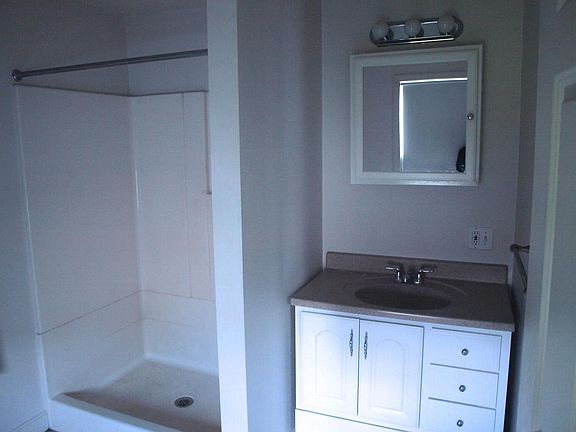 Large bathroom with shower.