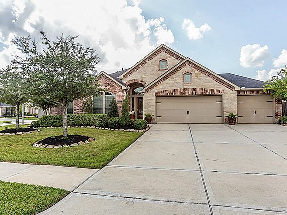 This home includes all sides masonry and a widened driveway allows for complete utilization of the three garage bays.