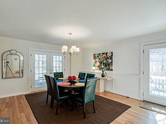 Large dining room leads to screened porch