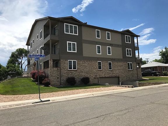 Picture show garage door to underground parking. This unit includes all the windows you see across the 2nd floor.