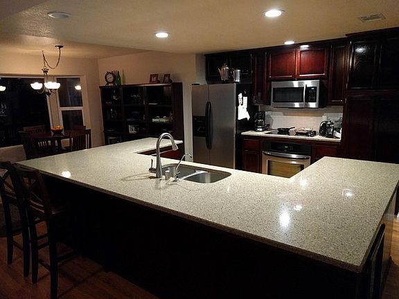 Quartz countertops and stainless steel appliances