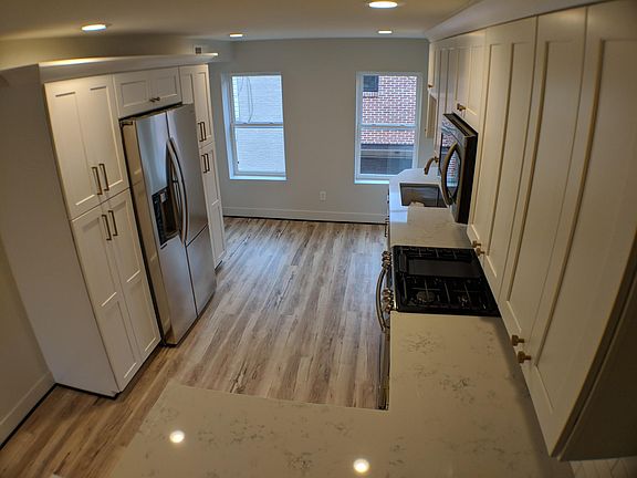 Kitchen with quartz countertops.