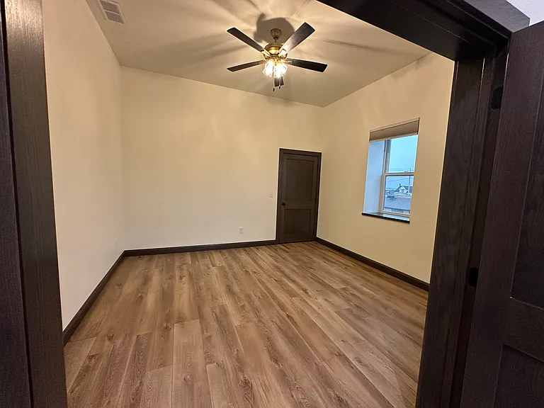 Bedroom with walk-in closet