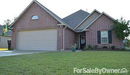 Beautiful Corner Lot!
						:
						Front view. Enclosed 2 car garage. Fresh landscaping.