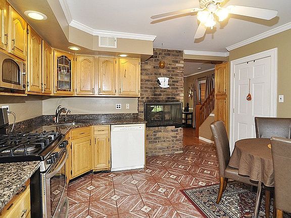 Eat-in Kitchen with Granite Counters and New Stainless Appliances